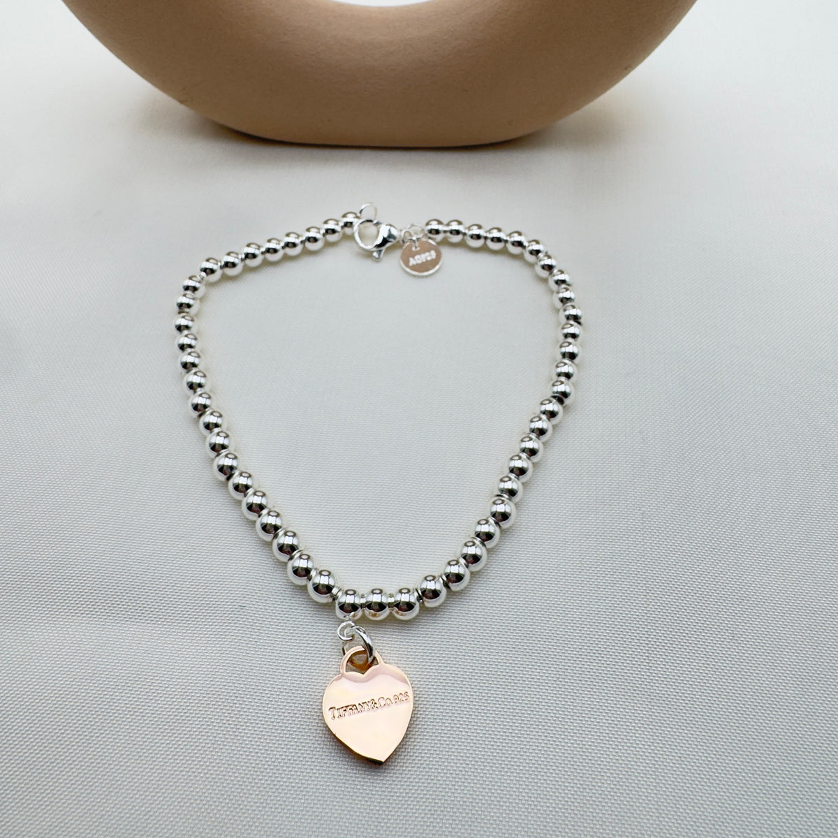 Bracciale Palline Argento con Cuore Oro