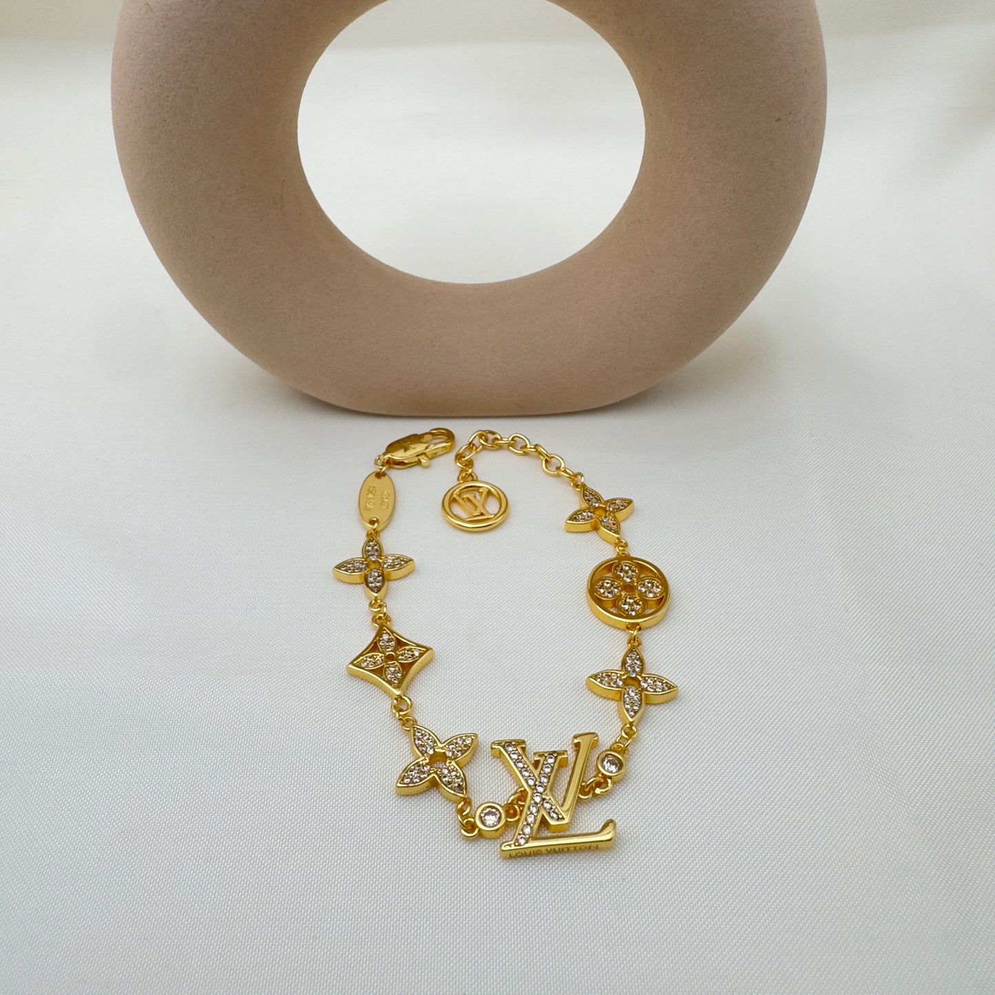 Bracciale Charms LV Oro