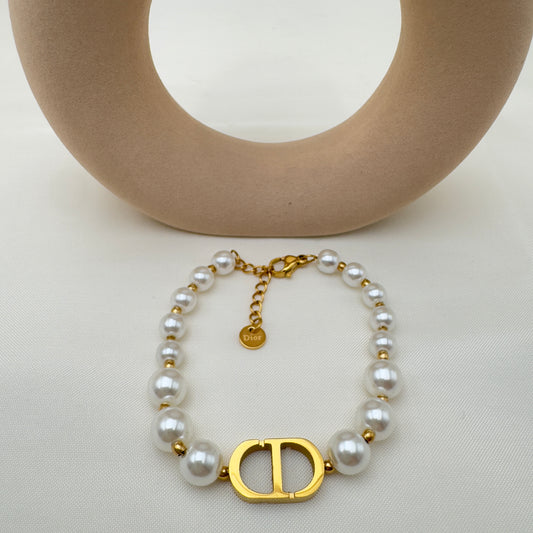 Bracciale con Perline e Dettaglio Iconico