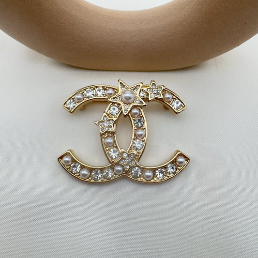 Spilla Chanel Perle & Stelle – Oro