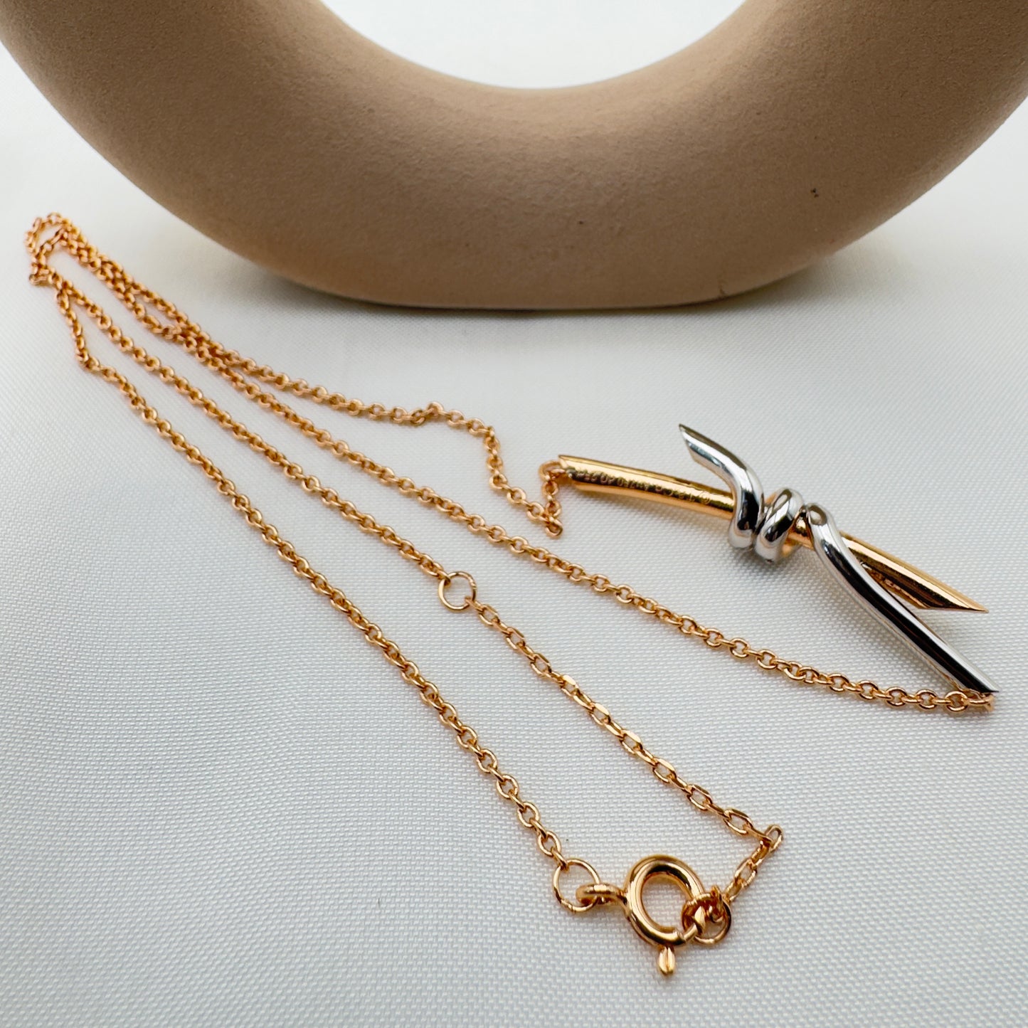 Collana Nodo Dorato con Cristalli Tiffany