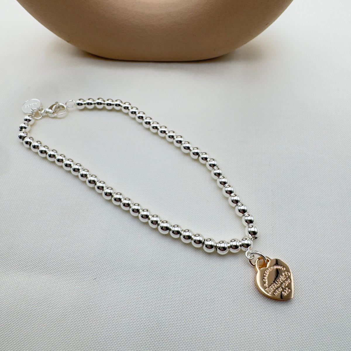 Bracciale Palline Argento con Cuore Oro