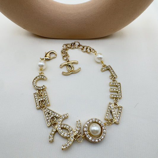 Bracciale Charms Oro con Cristalli e Perle