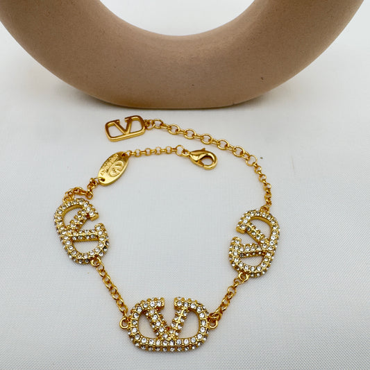 Bracciale Icona Dorata con Zirconi Vale